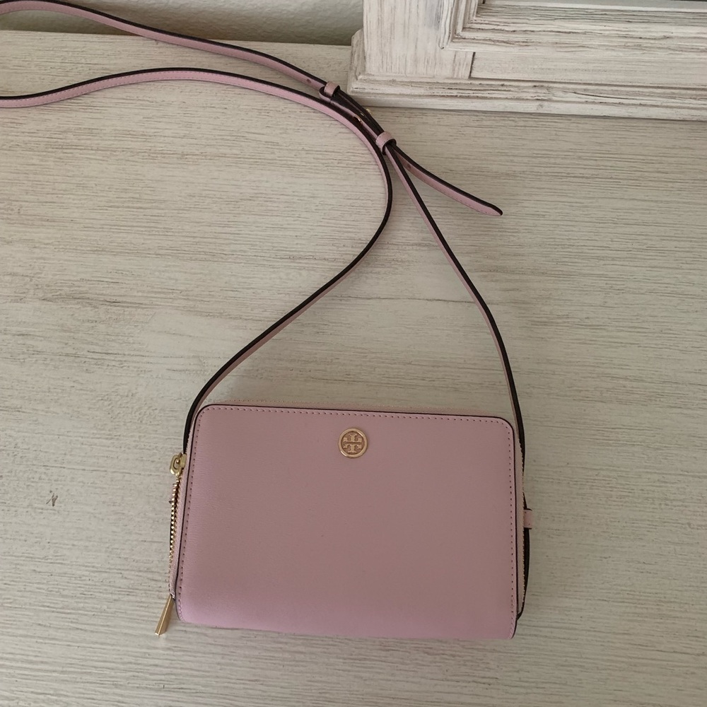 Pink Tory Burch saffiano crossbody wallet